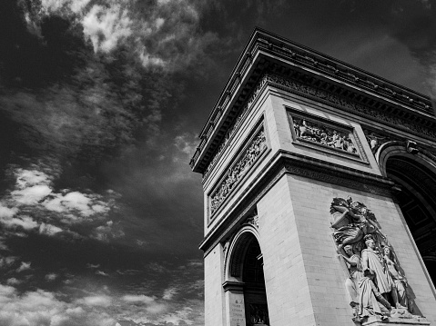 Looking up at the Arch de Triomphe