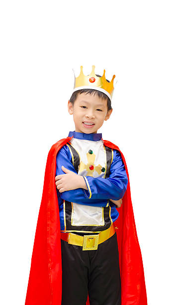 boy is dressed in suit of a prince stock photo