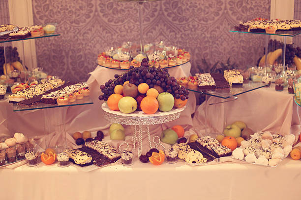 istock Table with delicious fruits and desserts 486742272