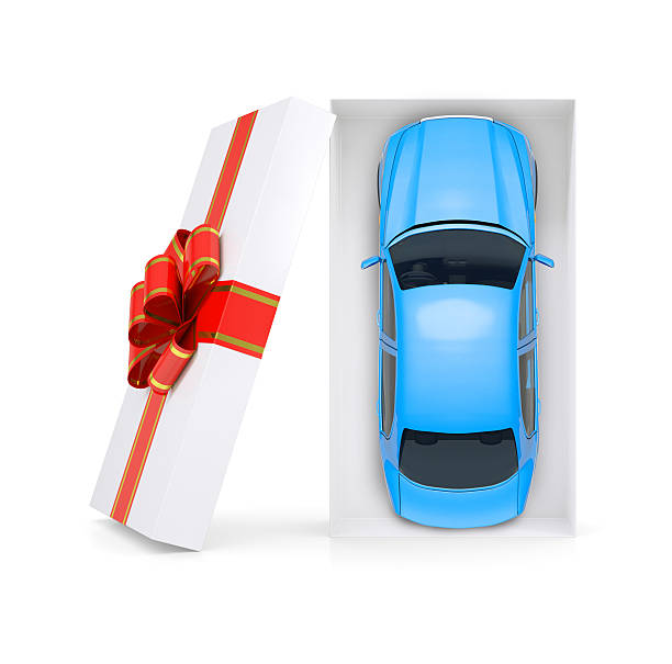 Blue car in gift box on white, top view