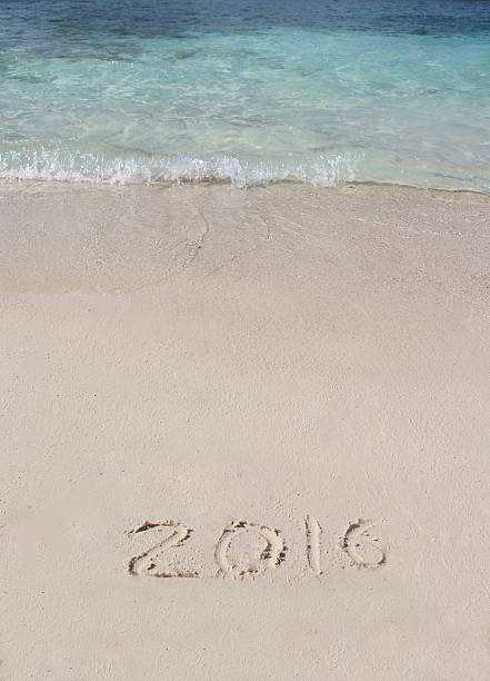 istock Handwriting inscription 2016 on the beach 486742912
