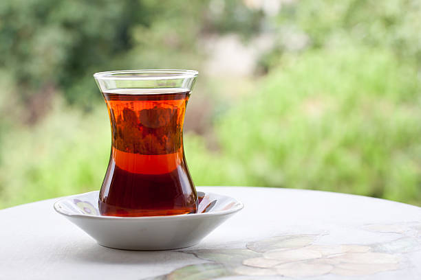 istock tea in a turkish thin tea glass 486743660