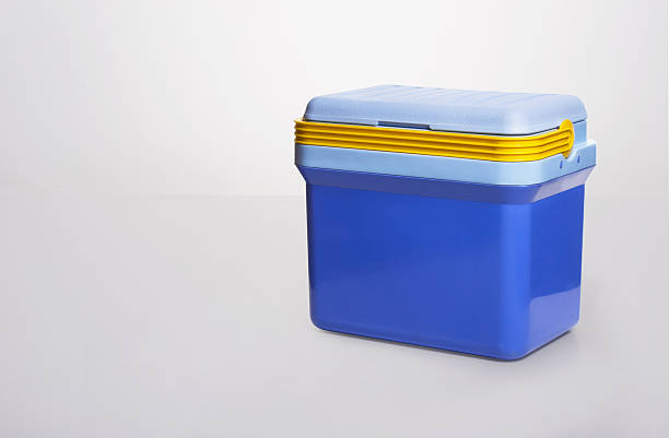istock beautiful  blue cooler with a. yelllow handle on . white background 486744040
