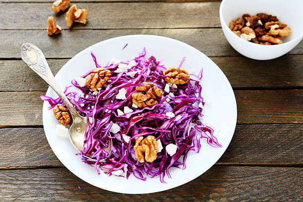 istock salad with red cabbage and slices of cheese 486744319