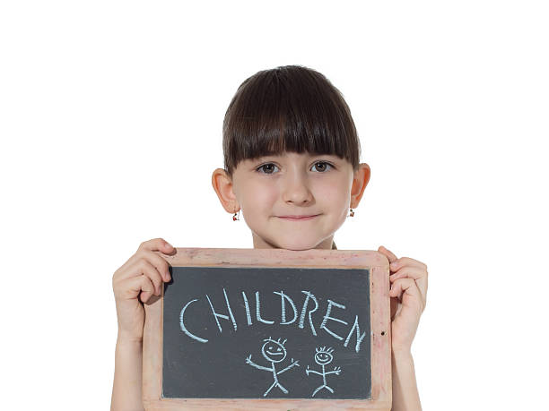istock Girl and chalkboard 486744893