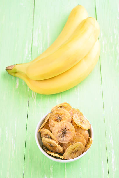 istock Homemade Banana Chips in Bowl 486747010