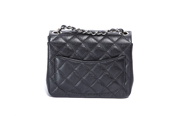 istock Woman leather handbag isolated white background 486747249
