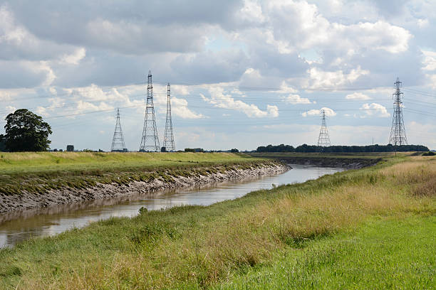 istock Overhead power lines span the River Nene in Cambridgeshire 486748766