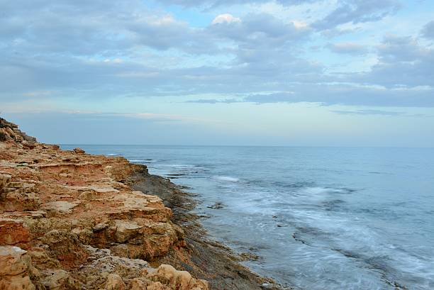 istock Rocky coast on sunset on a cloudy evening 486748783