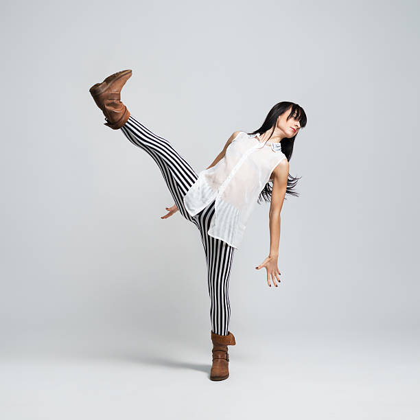 istock girl in boots takes a big step 486748935