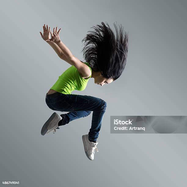 Beautiful Caucasian Woman Dancer Jumping Stock Photo - Download Image Now - Activity, Adult, Aerobics