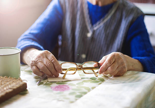 istock Old woman in the kitchen 486749835