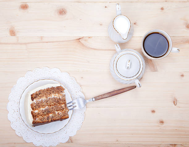 Top view of piece of pecan cake with buttercream icing