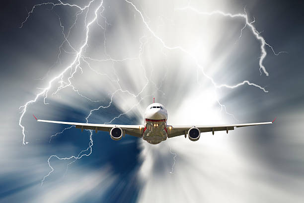 istock jet travelling through rainy stormy sky 486750517