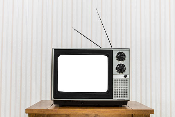 istock Old Television On Wood Table With White Cut Out Screen 486751062