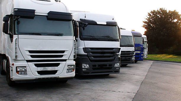 istock Row Of Parked Semi Trucks 486751066