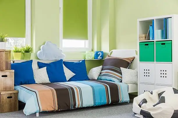 Image of contemporary style green boy room interior