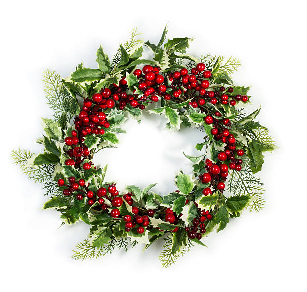 Christmas holly wreath Christmas wreath of holly berries and leaves isolated on white background thorn wreath stock pictures, royalty-free photos & images