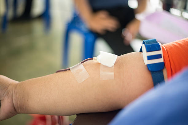だアームチェアに血で donates hemotransfusion 駅 - hemology ストックフォトと画像