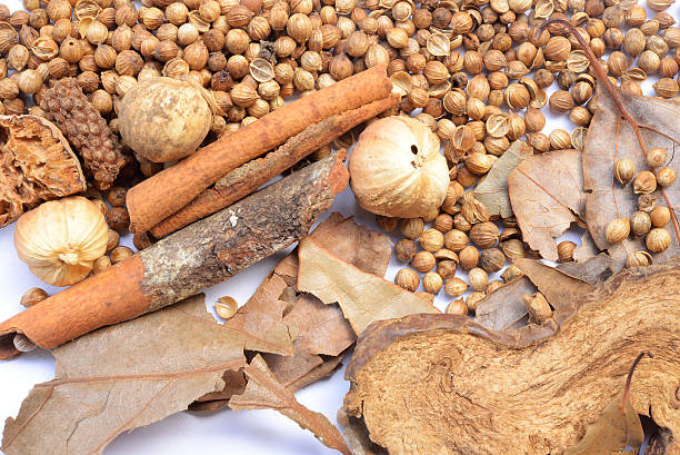 istock Nutmeg and other spices isolated on white 486752616