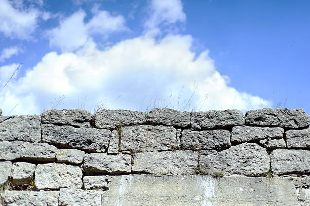 istock Sky and Stone wall background. Many stones 486753846