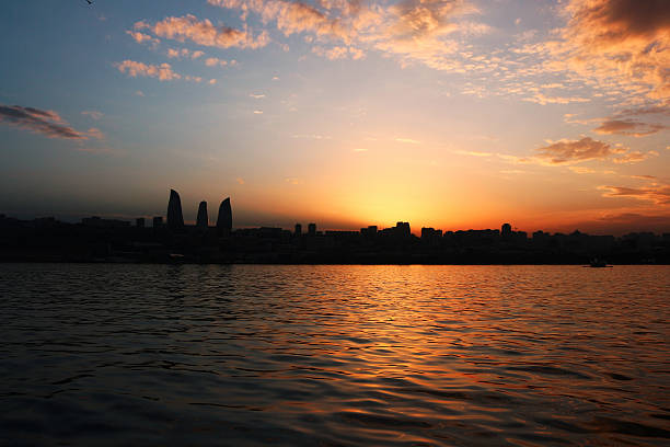 istock Silhouettes of city sunset, 486756408