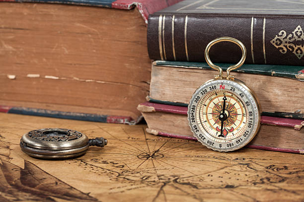 istock Vintage compass lies on an ancient map 486758370