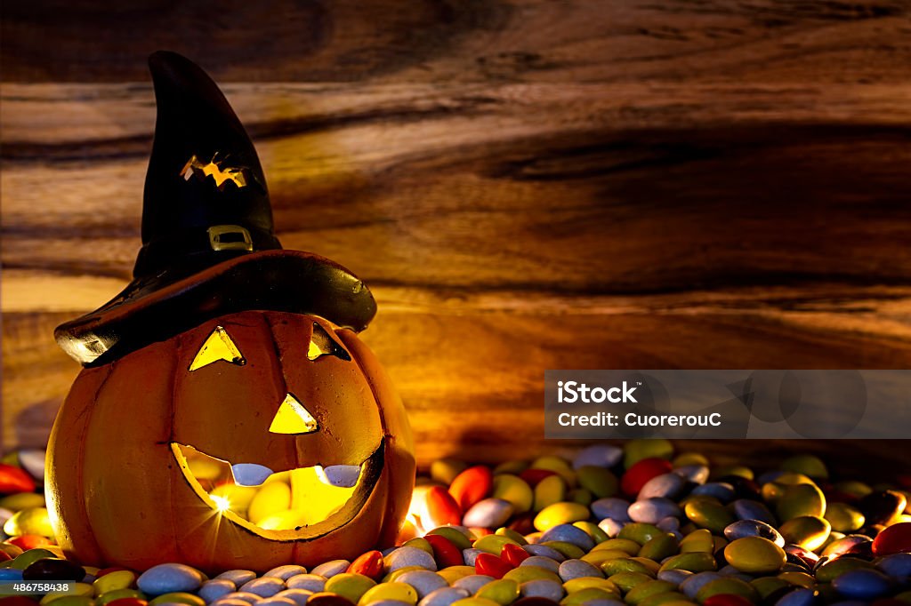 halloween pumpkin halloween pumpkin with chocolate candy candlelight 2015 Stock Photo