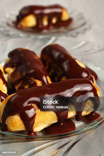 Chocolate Eclair Stock Photo - Download Image Now - Baked Pastry Item, Bakery, Chocolate