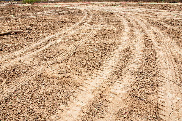 istock tractor tyre tracks on the ground 486762105
