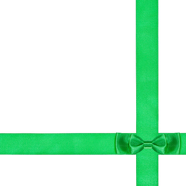 istock double green bow knot on two crossing silk ribbons 486762542