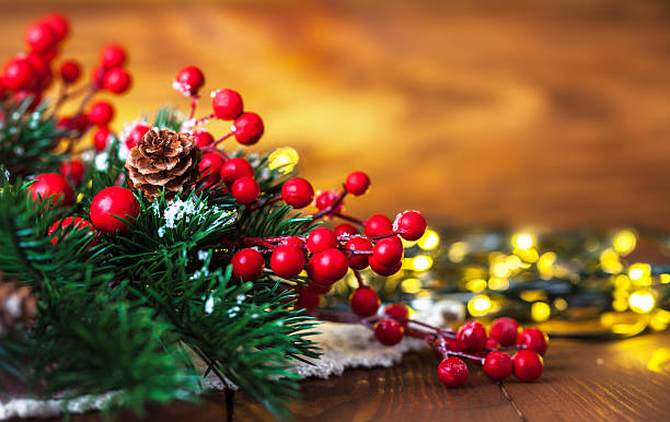 istock Christmas fir with pinecone and garland 486763286