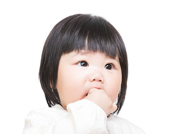 Baby girl bite finger
