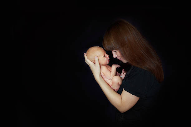 istock dad with newborn baby at home 486764972