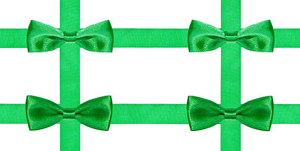 istock four big green bow knots on four satin ribbons 486765738