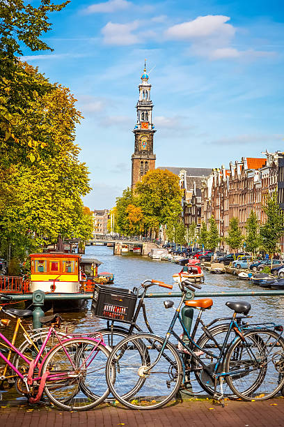 Prinsengracht canal in Amsterdam Western church and Prinsengracht canal in Amsterdam amsterdam stock pictures, royalty-free photos & images