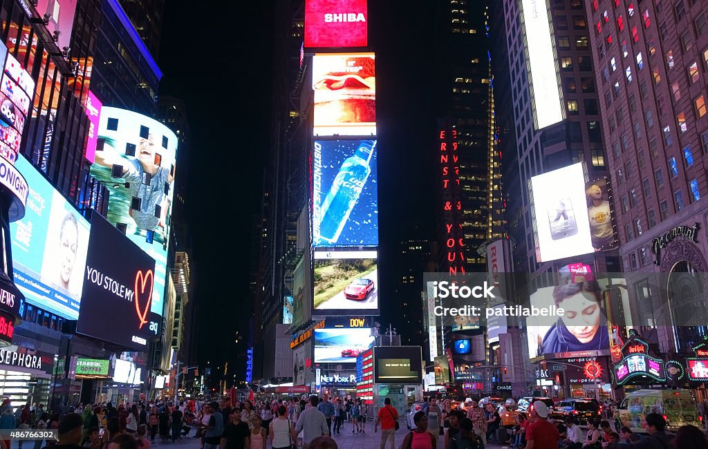 Times Square at Broadway in Manhattan, New York Times Square with its famous billboards and ads at Broadway in Manhattan, New York at night Times Square - Manhattan Stock Photo