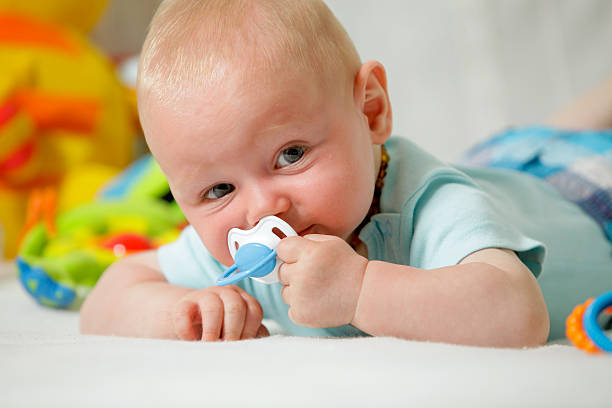 istock Real People: Cute Baby boy looking at camera 486766378