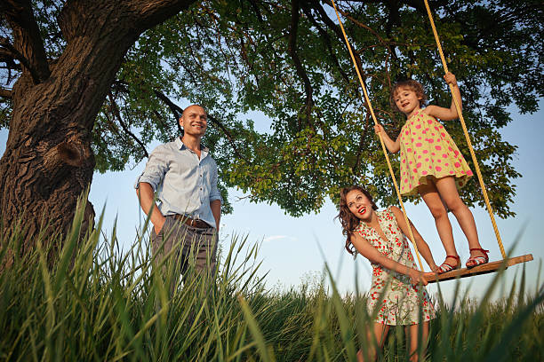 istock girl on the swing 486768553