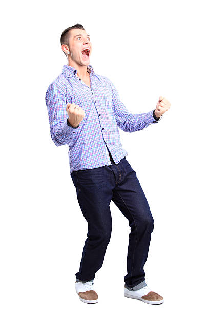 istock Excited handsome man with arms raised in success 486768843
