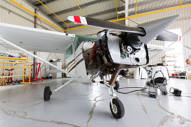 istock Repairing small propeller airplane 486769252