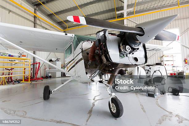 Repairing Small Propeller Airplane Stock Photo - Download Image Now - 2015, Air Vehicle, Airplane