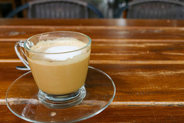 istock hot cappuccino coffee in glass cup 486771558