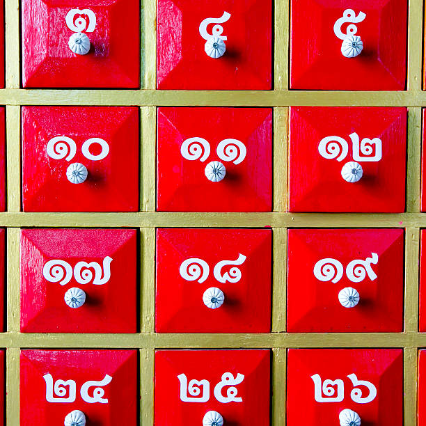 istock Red wood drawers with number for prediction papers 486774386