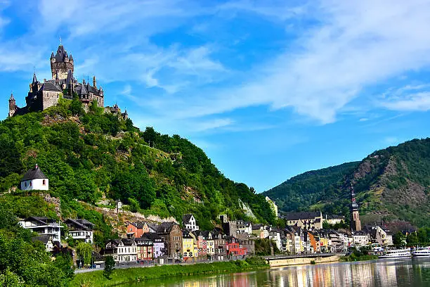 Castle Reichsburg sits above the medieval town of Cochem on the Mosel River, Germany.