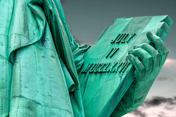 istock Statue of liberty is holding a tablet 486778726