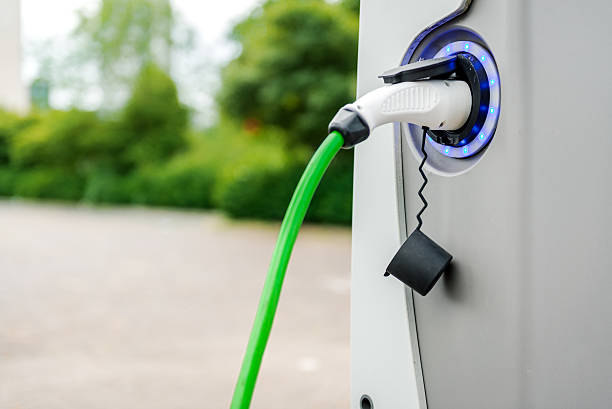Charging station Electric vehicle charging station battery charger stock pictures, royalty-free photos & images