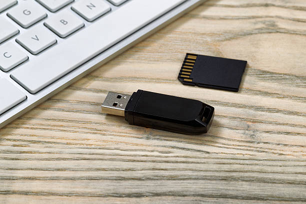 istock Close up of a data storage devices on wooden desktop 486779946