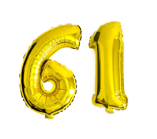 istock Number 61 written with golden foil helium balloons 486780048