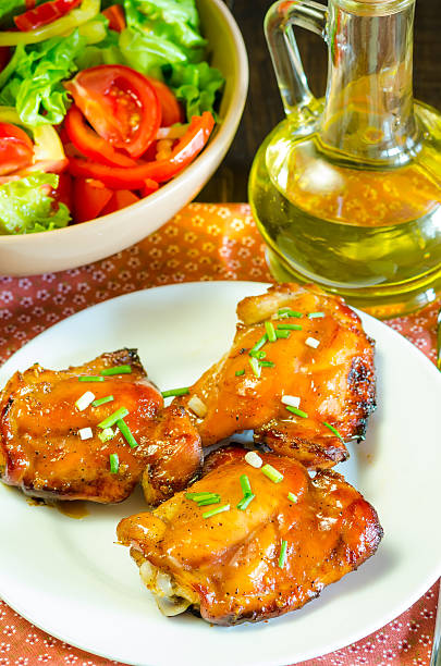 istock HONEY SOY CHICKEN GRILLED THIGHS AT WOODEN TABLE 486780452